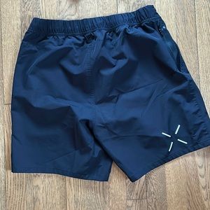 Two size medium work out shorts 1 black 1 gray. Brand is ten thousand.